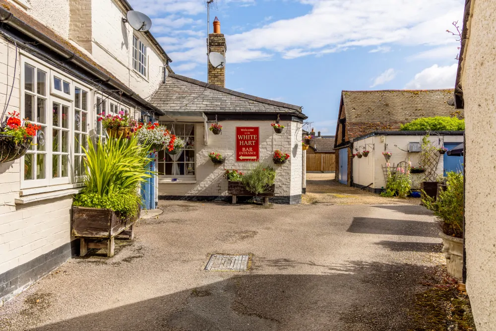Batemans Pub - White Hart. Great Staughton - Exterior Side Entrance