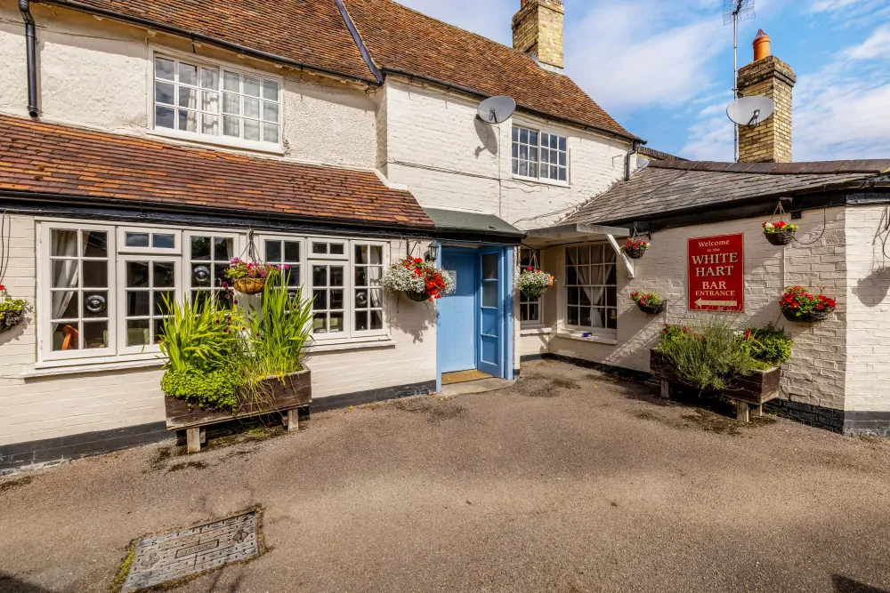 Batemans Pub - White Hart. Great Staughton - Exterior Side Entrance