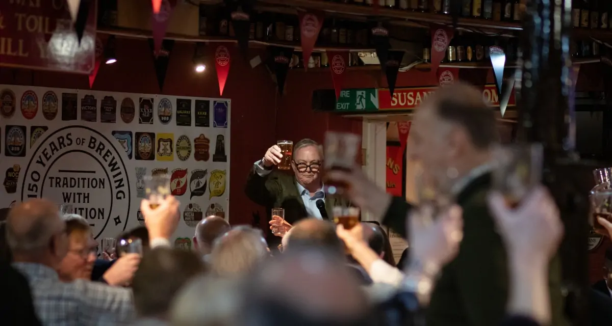 Batemans celebrate 150th anniversary with Brewers lunch - Keith Bott MBE raising a glass to Batemans with guests.